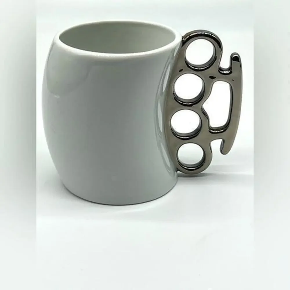 Brass knuckles coffee mug white and silver